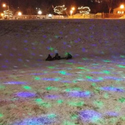 Glow in the Dark Sledding Park hill with glowing lights.