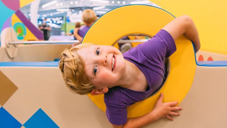 child playing at SPARK Museum