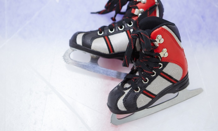 red and black ice skates on a rink. 