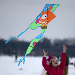 Kid with kite on Lake Harriet.