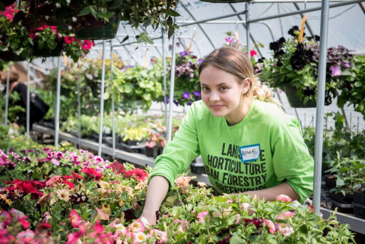 Student at Hennepin Technical College Plant Sale.