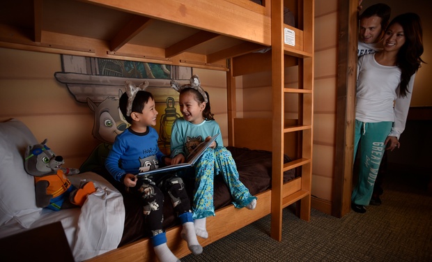 kids on a bunk bed reading