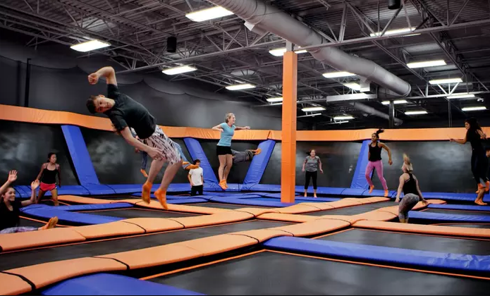 jumping on trampolines at Sky Zone