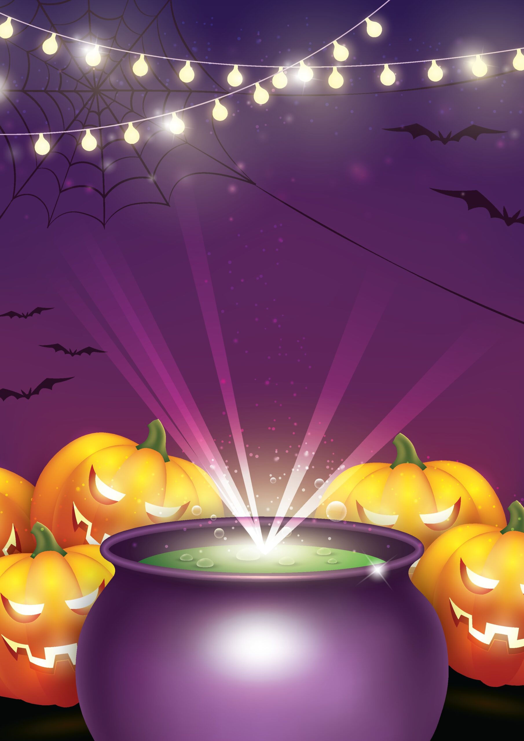 cauldron with jack-o-lanterns and string lights