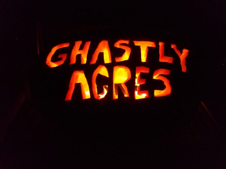 jack o lantern with ghastly acres wording