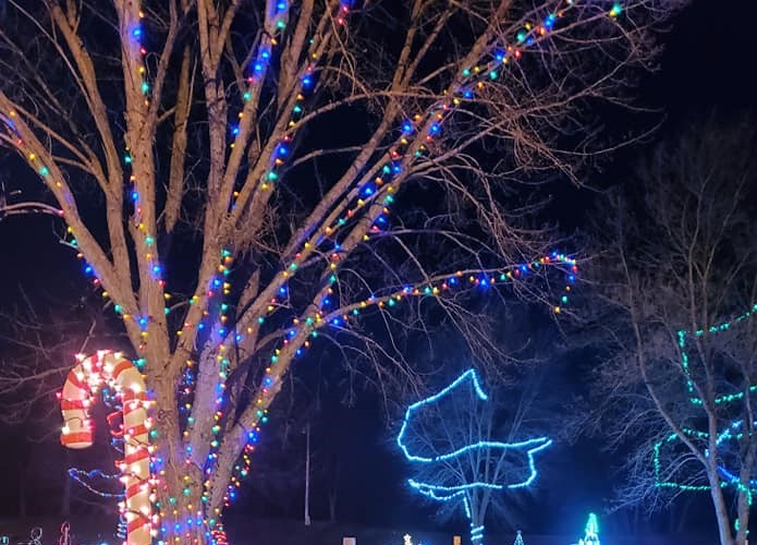 a house decorated with christmas lights.