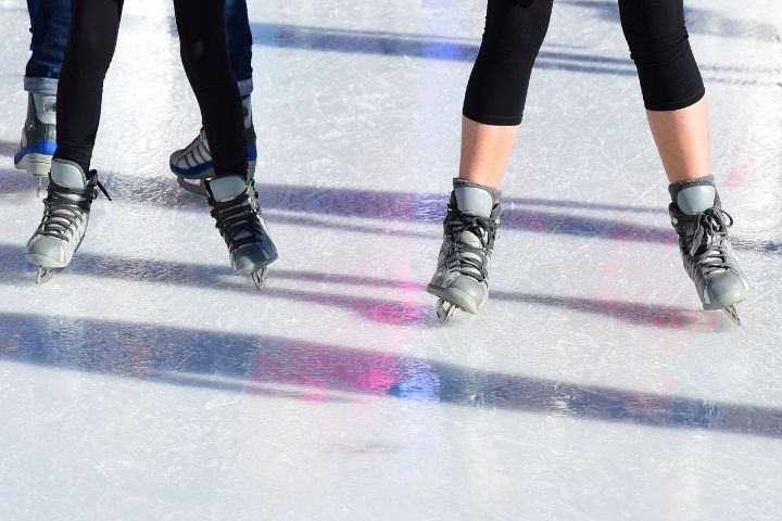 Skaters on Central Park Ice Skating Loop in Maple Grove.