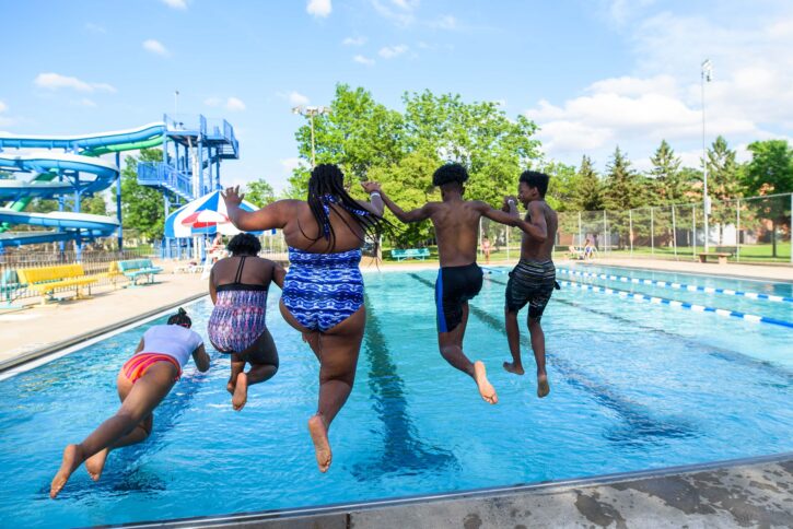 kids jumping into pool at North Commons Water Park