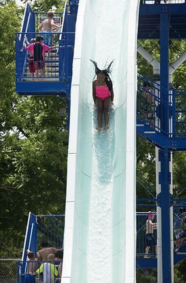 girl sliding down waterslide