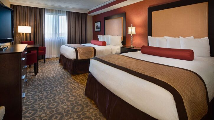 two queen beds in hotel room