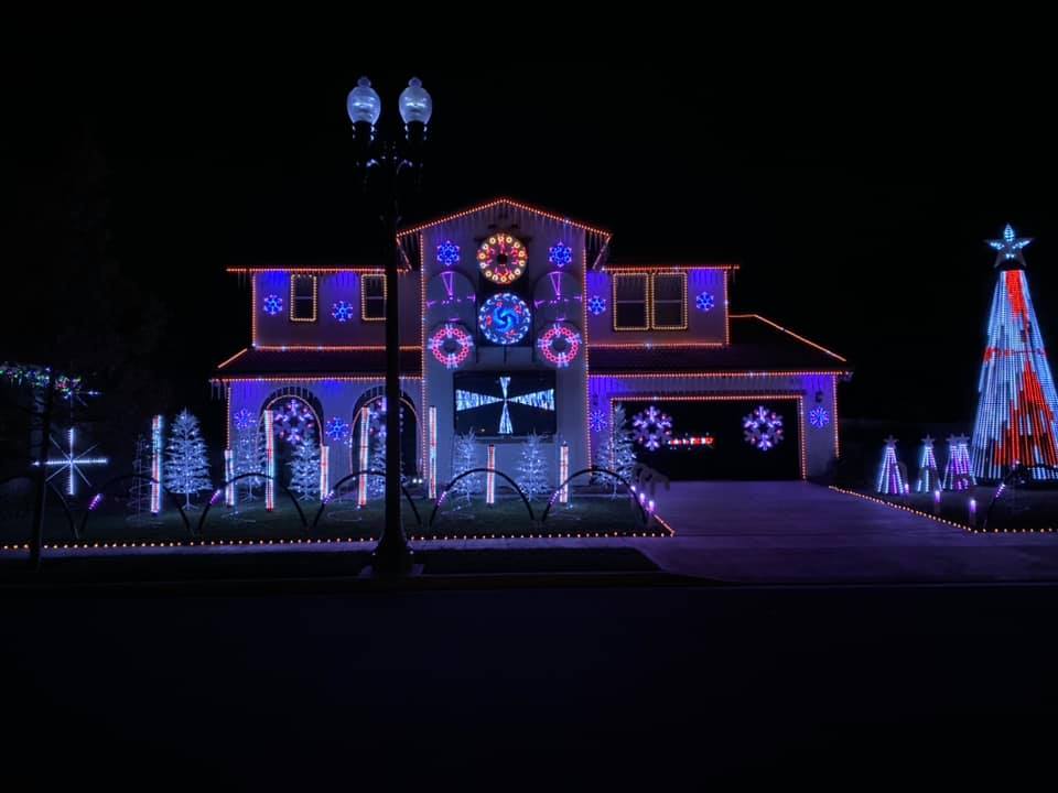 a house decorated with christmas lights.