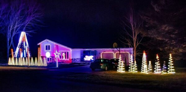 a house decorated with christmas lights.