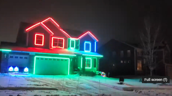 a house with red and green christmas lights