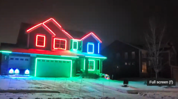 a house with red and green christmas lights.