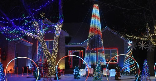 a house decorated with christmas lights.