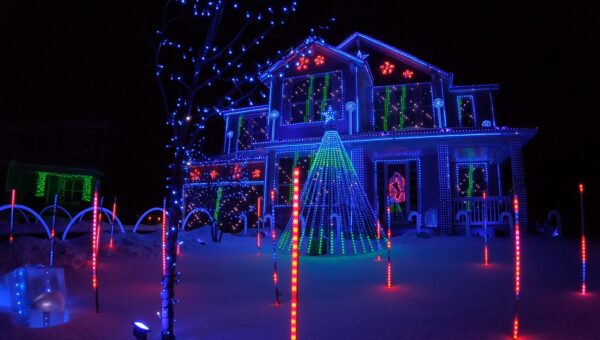 a house decorated with christmas lights.