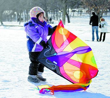 Lake Harriet kid with kite.