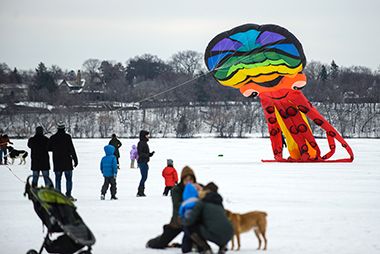 Lake Harriet Kites and people on the frozen lake. 