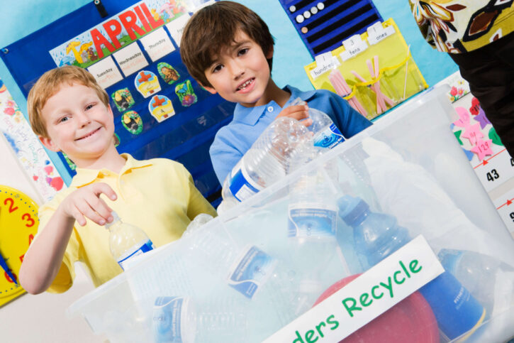 Kids recycling in school. 