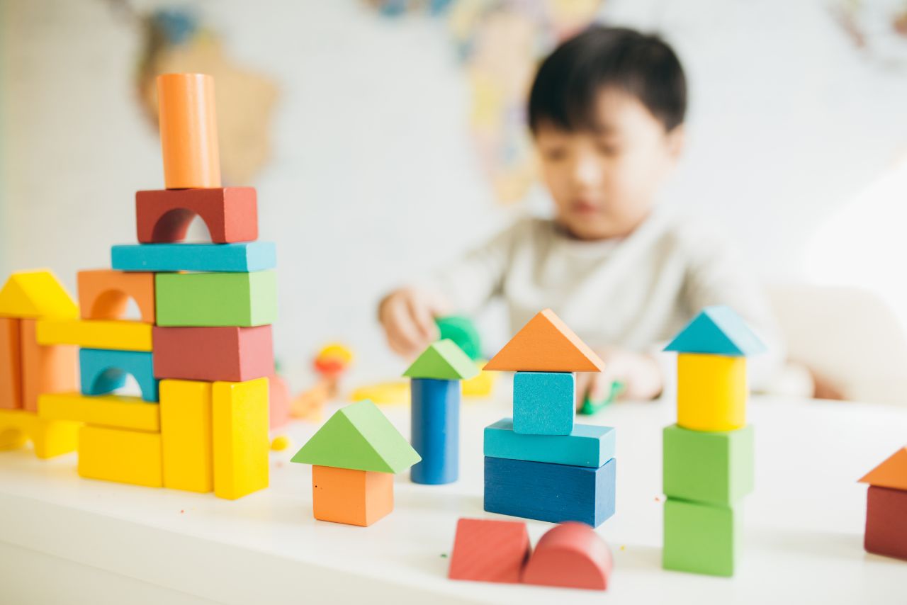 child playing with blocks