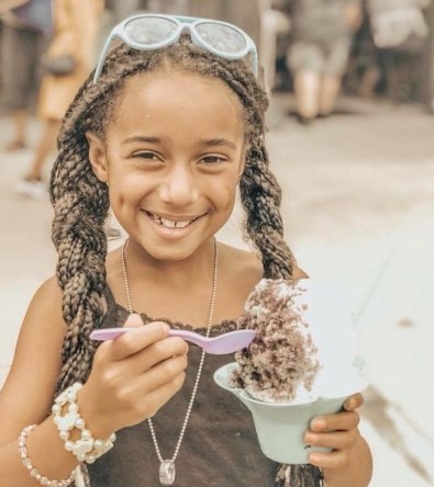 girl eating ice cream at grand old day