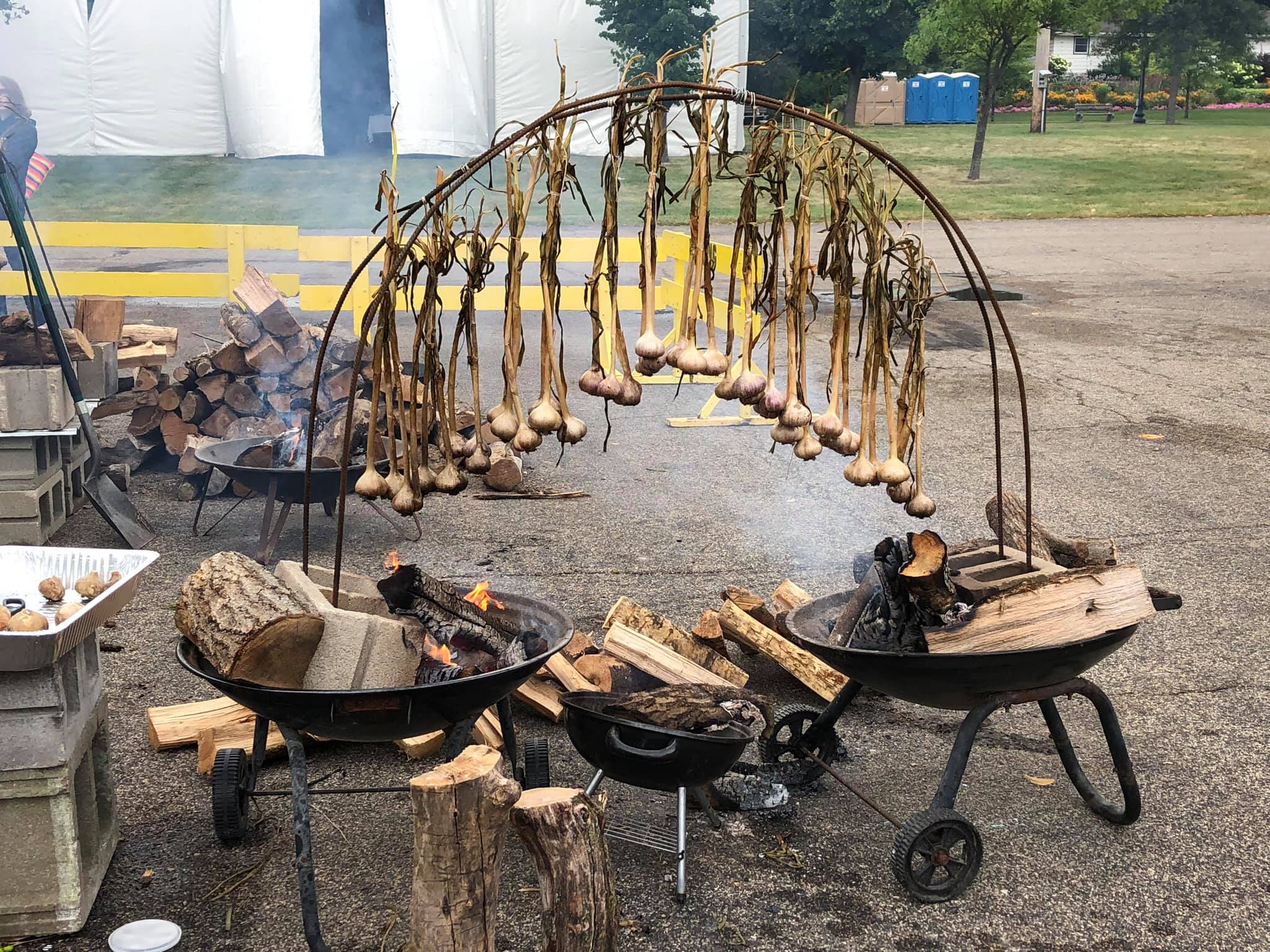 Roasting Garlic over open fire at Minnesota Garlic Festival.
