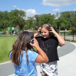 2 girls wearing headphones at Calmapalooza in Golden Valley.
