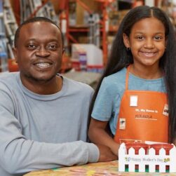 Dad and daughter at Home Depot Free Kids Workshop.