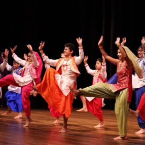 Indian dancers on stage.