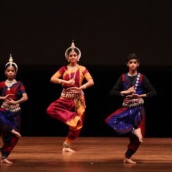 Diwali dancers hit a pose.