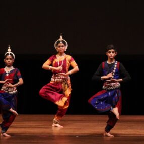 Diwali dancers hit a pose.