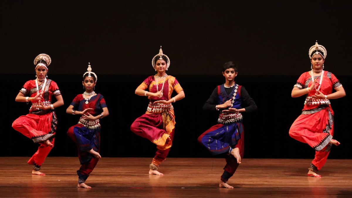 Diwali dancers hit a pose. 