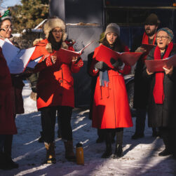 Carolers outside at Christmas in Germany event.