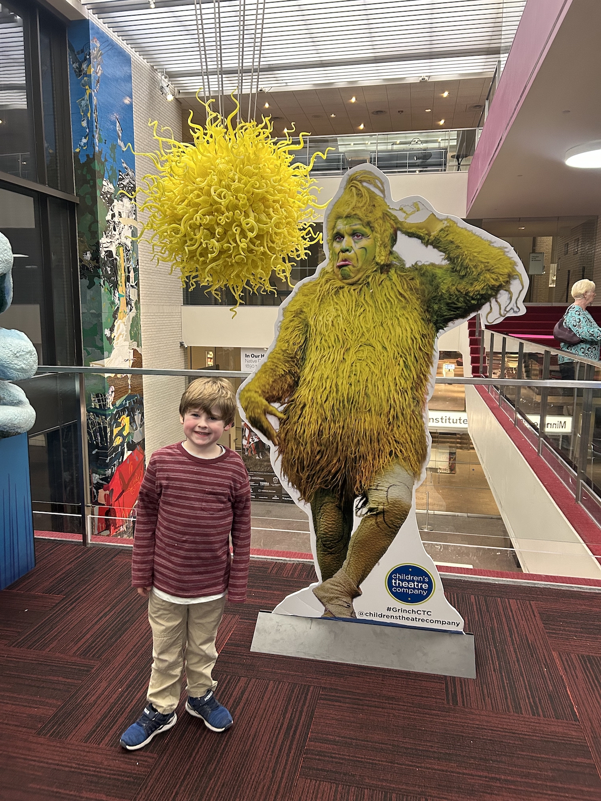 Author's son in front of Grinch cut out at CTC.