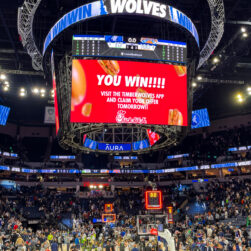 Timberwolves Free Chick-fil-A offer on big screen at Target Center.