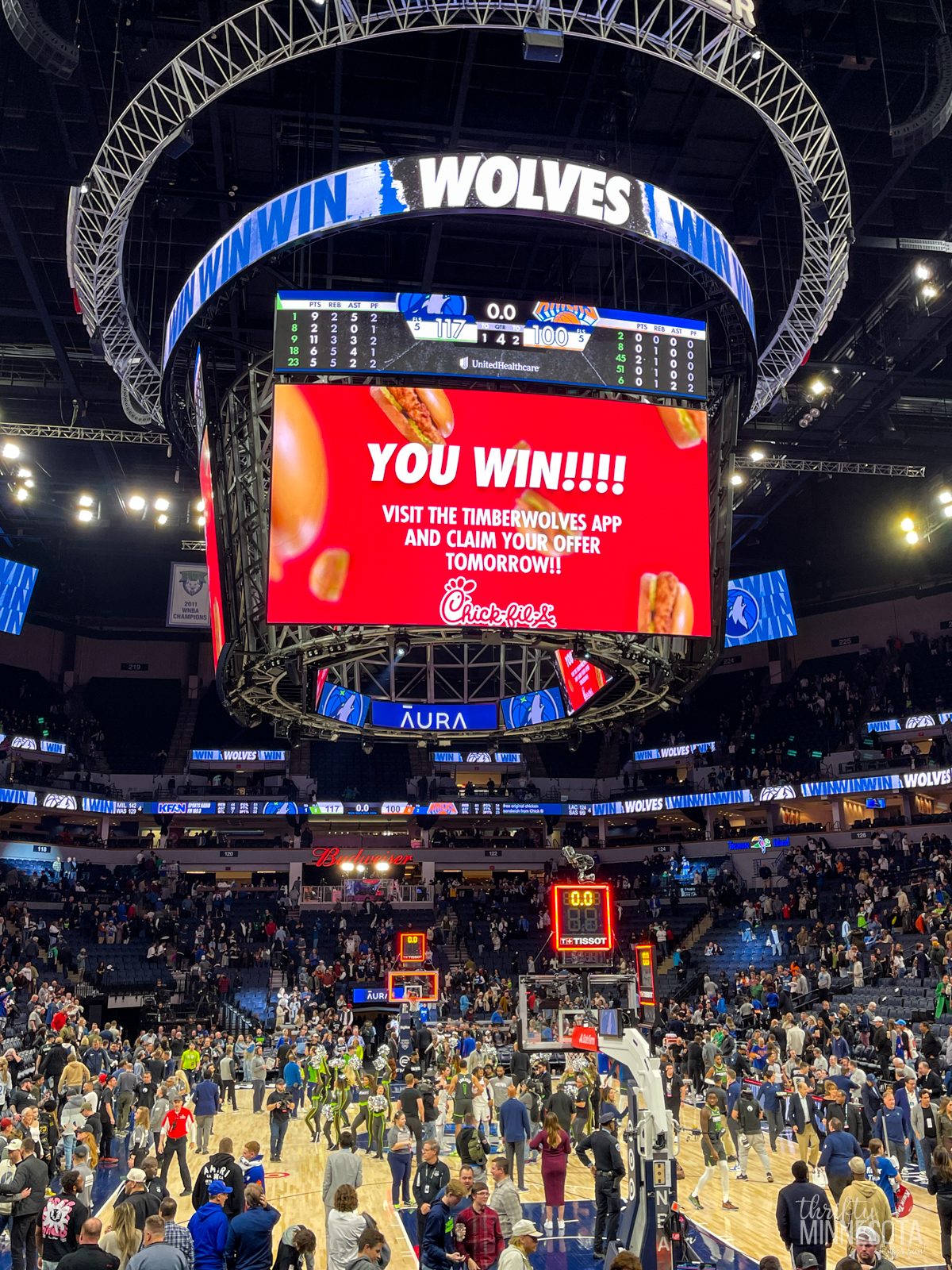 Target Center Minneapolis with Timberwolves Chick-fil-A Offer on the big screen above the court.