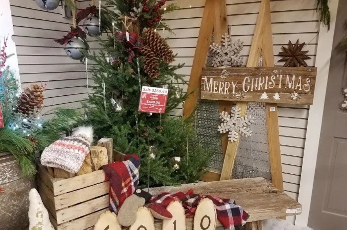 A porch decorated with a Christmas theme.