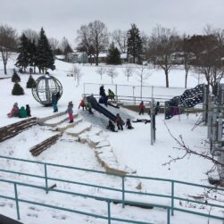 Sledding at the playground at highland park community center.