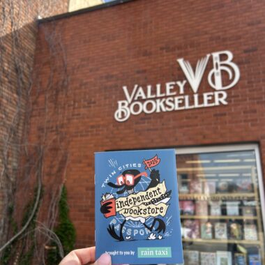 2025 Passport in front of Valley Bookseller.