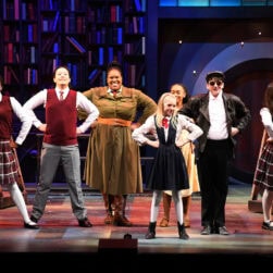 Matilda the musical characters on stage.