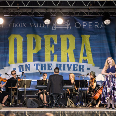 Opera on the river stage with singer.