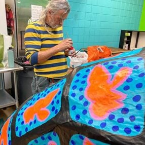 In the Heart of the Beast Painter with puppet.