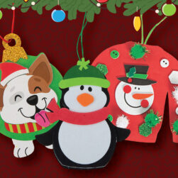 Festive ornaments including a cheerful dog with a Santa hat, a cute penguin in a green hat, and a red sweater with a snowman design. The background is dark red with a decorative holiday border featuring green garland and ornaments.