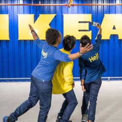 People in front of IKEA signage.
