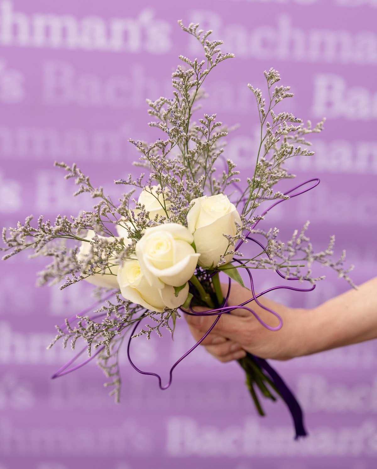 Bachmans Petite Prom Bouquet with white roses.