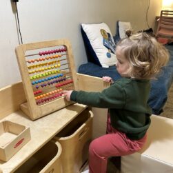 Kid playing in Rebe's Play Cafe.