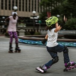 Children roller skating in Rice Park in St. Paul MN.