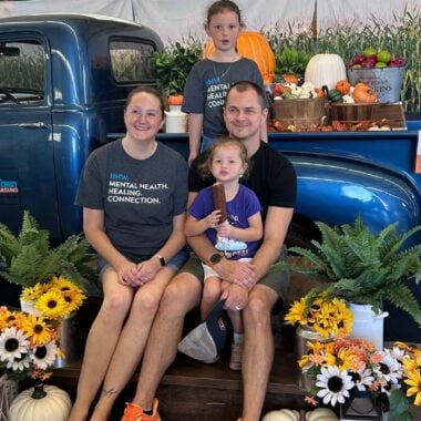 Family photo opp at Fall Festival at The Anoka County Fairgrounds.