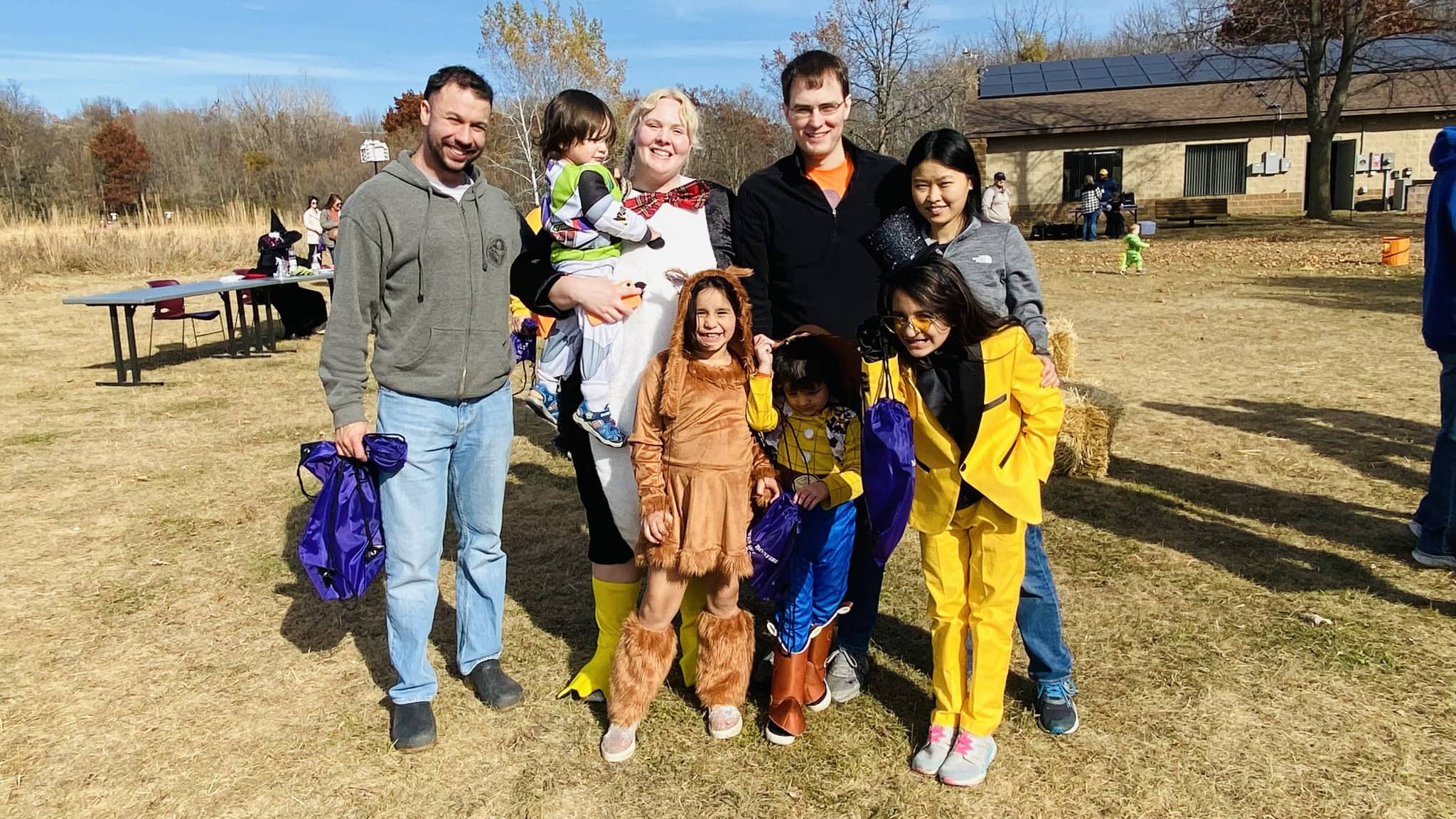 Families in costume at Bats Bones and Bonfires at River Bend Nature Center.