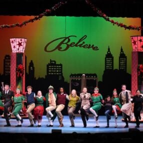 Actors on stage during Elf the musical jr.